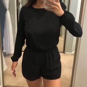 Black high neck long sleeve romper with back slit
